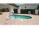 Inviting community spa for residents, offering a relaxing and private setting with manicured landscaping at 11743 Se 174Th Loop, Summerfield, FL 34491