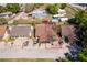 Aerial view showing the house with a red outline on a sunny day at 1306 Vine St, Leesburg, FL 34748