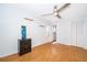 Bright bedroom with wood floors and double door closet at 1306 Vine St, Leesburg, FL 34748