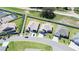 Birds eye view of homes in the neighborhood that also features mature landscaping at 1435 Jeremy Cir, The Villages, FL 34762