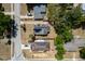 Aerial view of property showing lot lines, house with solar panels and surrounding neighborhood at 1515 Washington Ave, Eustis, FL 32726