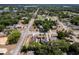 Drone view showcasing the neighborhood's layout, road network, and community amenities at 1515 Washington Ave, Eustis, FL 32726