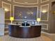 Modern reception desk with stylish lighting and contemporary decor at 155 Crepe Myrtle Dr, Groveland, FL 34736