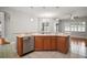 Spacious kitchen featuring stainless steel appliances and an island sink at 15803 Fairview Pt, Tavares, FL 32778