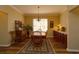 Inviting dining room featuring classic decor and a chandelier at 1721 Carrera Dr, The Villages, FL 32159