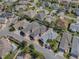 A neighborhood featuring manicured lawns and an aerial view shows the location of the house with a defined red line at 1829 Foxwood Ln, The Villages, FL 32162