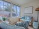 Relaxing sunroom with comfortable seating and natural light from the large windows at 1829 Foxwood Ln, The Villages, FL 32162