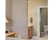Bathroom featuring a vanity with adjacent lavatory behind an open door at 2523 Mariel Way, The Villages, FL 32162