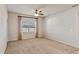 Bright bedroom with a ceiling fan and neutral carpet at 3341 Winchester Estates Cir, Lakeland, FL 33810