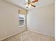 Bright bedroom with a ceiling fan and neutral carpet at 3341 Winchester Estates Cir, Lakeland, FL 33810