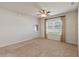 Bright bedroom with a ceiling fan and neutral carpet at 3341 Winchester Estates Cir, Lakeland, FL 33810