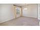 Living room with carpet flooring and neutral paint at 3341 Winchester Estates Cir, Lakeland, FL 33810