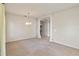 Living room with carpet flooring and neutral paint at 3341 Winchester Estates Cir, Lakeland, FL 33810