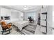 Cozy bedroom with tray ceiling, neutral colors, and built-in cabinets at 6126 Mulligan Run, The Villages, FL 32163