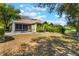 Exterior view of backyard with patio at 6200 Topsail Rd, Lady Lake, FL 32159