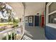 Spacious porch featuring white railings and blue siding, offering a cozy outdoor space at 7549 Frog Log Ln, Leesburg, FL 34748