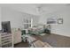 Bedroom featuring hardwood floors, natural light, and a ceiling fan at 910 Rich Dr, Mount Dora, FL 32757