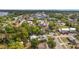 Aerial view of the home and surrounding community near the lake at 952 W Montrose St, Clermont, FL 34711