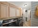 Functional laundry room with modern washer and dryer, ample cabinet space, and stylish flooring at 952 W Montrose St, Clermont, FL 34711