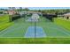 Overhead view of basketball and tennis courts in a lovely community setting, great for an active lifestyle at 981 Fiesta Key Cir, Lady Lake, FL 32159