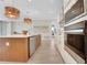 Modern kitchen featuring stainless steel appliances, a large island, and stylish pendant lighting at 981 Fiesta Key Cir, Lady Lake, FL 32159