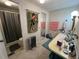Bathroom featuring a vanity, mirror, and shower/tub combo with unique Geisha themed decoration at 101 Royal Palm Dr, Leesburg, FL 34748