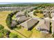 A high aerial of many homes in this community, and the surrounding area at 1023 Timbervale Trl, Clermont, FL 34715