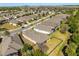 Aerial view of the neighborhood showcasing the well-planned streets and home landscapes at 1023 Timbervale Trl, Clermont, FL 34715