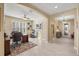 Well-lit office showcases tile flooring, arched doorways, and a comfortable workspace at 1023 Timbervale Trl, Clermont, FL 34715