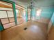 Open floorplan dining area with chandelier and wood floors at 103 Caroline Ave, Lady Lake, FL 32159