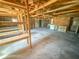 Garage with exposed beams and shelving at 103 Caroline Ave, Lady Lake, FL 32159