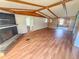 Living room with wood floors and view to other rooms at 103 Caroline Ave, Lady Lake, FL 32159