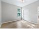 Light bedroom with closet and window at 11759 Se 91St Cir, Summerfield, FL 34491