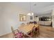 Welcoming dining area featuring hardwood floors and an open layout at 1417 Forest Acres Dr, The Villages, FL 32162