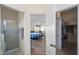 Hallway view reveals open sightlines into the bedroom and bathroom spaces that create an inviting and spacious feel at 1417 Forest Acres Dr, The Villages, FL 32162