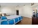 Comfortable main bedroom with hardwood floors, vaulted ceiling, and a ceiling fan at 1417 Forest Acres Dr, The Villages, FL 32162