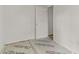 Bright room with fresh white walls, door, and flooring, showcasing a clean slate for customization at 17108 Pine Ridge Dr, Umatilla, FL 32784