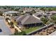 A screened-in lanai and carefully landscaped yard offers serene outdoor living at 1907 Anderson Ct, The Villages, FL 32162