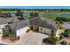 Lovely single-story home with an attached two car garage overlooking a lush golf course and pond at 1907 Anderson Ct, The Villages, FL 32162
