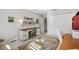 Office with natural light, desk, shelves, closet and decorative rug at 2213 Evans Prairie Trl, The Villages, FL 32163