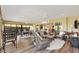 Sunroom with seating and lounge areas at 2213 Evans Prairie Trl, The Villages, FL 32163