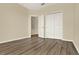 Neutral bedroom with hard surface floors and closet at 2520 Tanner Ter, Kissimmee, FL 34743