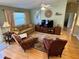 Comfortable living room with natural light, stylish decor, and a relaxing ambiance at 2569 Errol Ter, The Villages, FL 32162