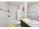 Bathroom featuring white fixtures, a shower and tub combination and a bright vanity at 2916 Canary Ln, Tavares, FL 32778