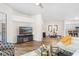 Open-concept living room showcasing dining area and modern fixtures at 6152 Topsail Rd, Lady Lake, FL 32159