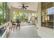 Enclosed patio featuring bright views, offering an easy transition between indoor and outdoor spaces at 6152 Topsail Rd, Lady Lake, FL 32159