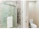 The shower features marble tile and a glass door at 6152 Topsail Rd, Lady Lake, FL 32159