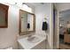 Well-lit bathroom with a vanity, mirror, and shower-tub combination at 628 Mount Homer Rd # 4B, Eustis, FL 32726
