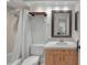 Functional bathroom featuring a vanity, shower-tub, and stylish fixtures at 628 Mount Homer Rd # 4B, Eustis, FL 32726