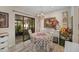 Cozy dining area with natural light and glass patio doors to the outside at 628 Mount Homer Rd # 4B, Eustis, FL 32726